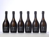 six bottles of champagne lined up in a row
