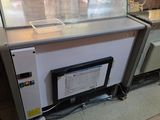 l'image d'une machine installée dans une pièce