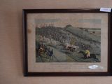 a picture of a painting of a horse race on the wall