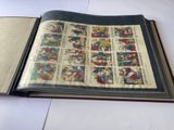 an open book with comics on it sitting on a table