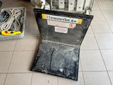a box with wires and wires in it on the floor