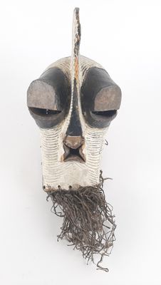 an image of a wooden mask with a long beard on a white background