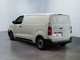 a picture of a white van parked in a room