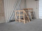 a picture of a room with a ladder and a garage door