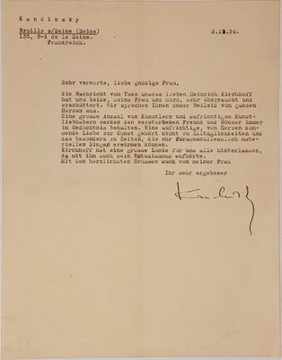 a letter written in black ink on a beige paper