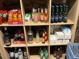 many bottles and containers on the shelves in the room