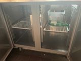 a refrigerator that has a lot of food inside of it