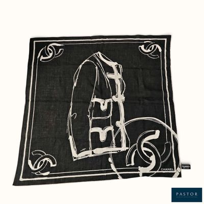 écharpe noire et blanche sur laquelle est représentée une veste
