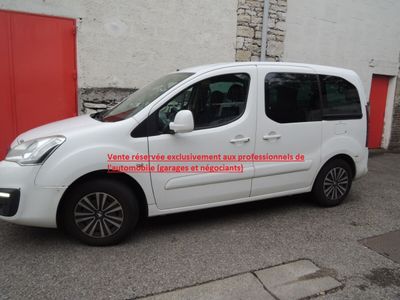 the white van is parked in front of a red door
