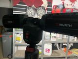 a camera that is sitting on a tripod in a store