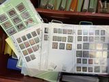 a lot of different stamps on the pages of a book