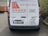 a van that is parked on the side of the road