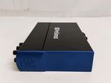 a close up of a blue and black device on a white surface