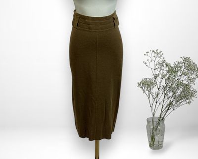 ALAÏA, Paris. Jupe en maille kaki à deux poches, taille élas…