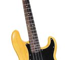 a yellow electric bass guitar on a white background