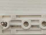a picture of a close up of a piece of white plastic