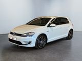 a white volkswagen golf is parked in a white room