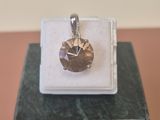 pendentif plaqué argent orné d'une pierre facettée en son centre