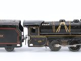 a toy train that is sitting on a white surface