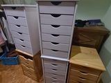 several drawers are stacked on top of each other in a room