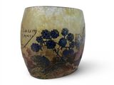 a vase that has a picture of flowers on it