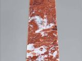 marble obelisk with a black base and a red and white marble obelisk with a black base and a red and white marble obelisk