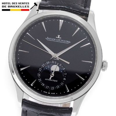 an image of a close up of a wrist watch with a black dial