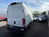 a white van that is parked in a parking lot