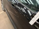 a sticker on the door handle of a car