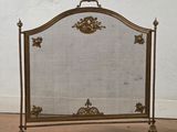 fireplace screen in the shape of a fireplace screen with a decorative design
