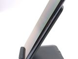 a close up of a cell phone on a stand