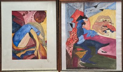 deux tableaux encadrés représentant un homme et une femme assis sur un canapé