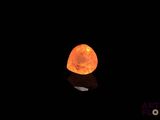 an image of a glowing rock in the dark