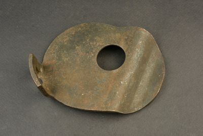 a metal object with a hole in the middle of it