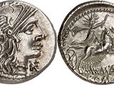 a silver coin with an image of a woman and a man on it