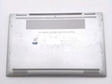 a silver laptop that is sitting on a table