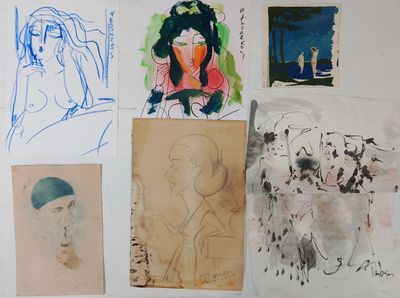 many drawings and pictures on the wall of this room
