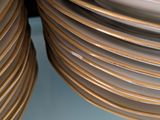 many plates stacked on top of each other on a table