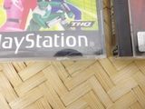 two video games sitting on a table next to each other