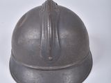 a helmet on a white surface with a white background