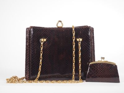 an image of a brown snake skin purse and chain purse