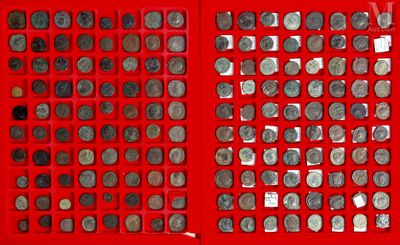 a picture of a bunch of coins in a red box