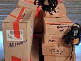 boxes stacked on top of each other with a scare on top of them