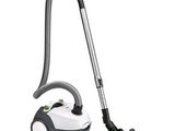 a white and black vacuum cleaner and a black and white vacuum