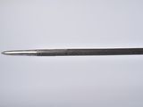 a close up of a metal pen with a metal tip