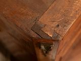 a close up of a piece of wood that has been damaged