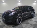 the black ford kad is parked on a checkered floor