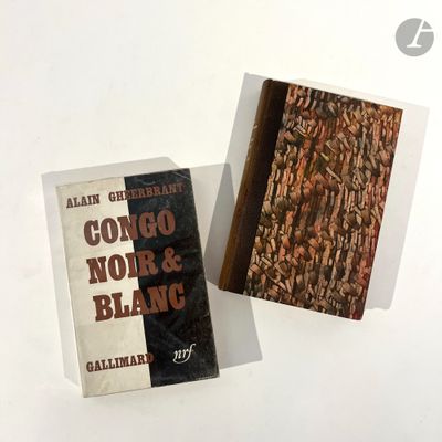 two books that are sitting next to each other on a table