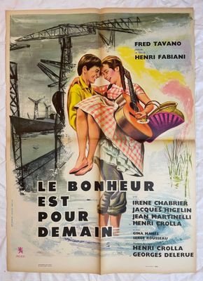 une vieille affiche de cinéma représentant un homme portant une femme sur son dos