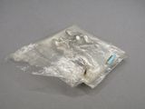 a plastic bag with a bunch of nuts inside of it